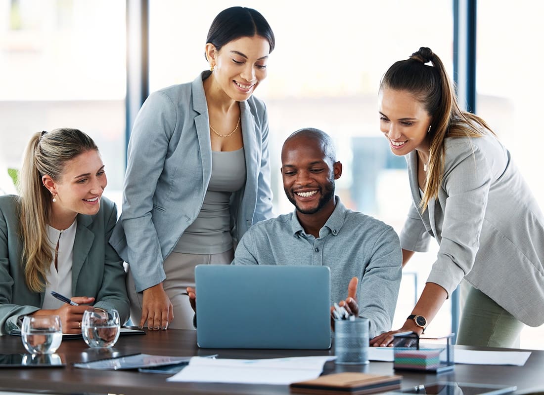 Insurance Solutions - Group of Colleagues Having a Strategy Meeting